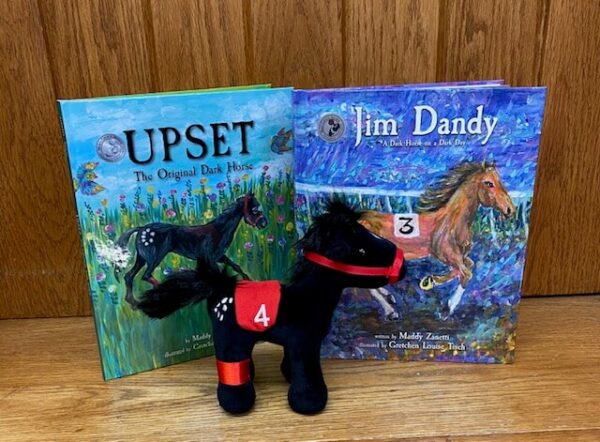 two books-upset-Jim dandy-plush black horse with red harness