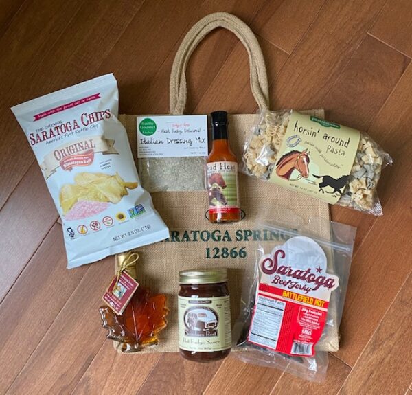 Porch package includes potato chips, dip, hot sauce, horse pasta, maple syrup, fudge, beef jerky. Free Tote bag
