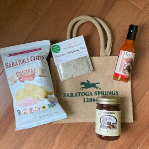Porch Package includes potato chips, dip, hot sauce, fudge. Free Tote bag