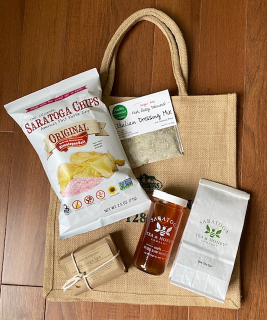 Porch package includes potato chips, dip, honey, tea, local soap. Free Tote bag