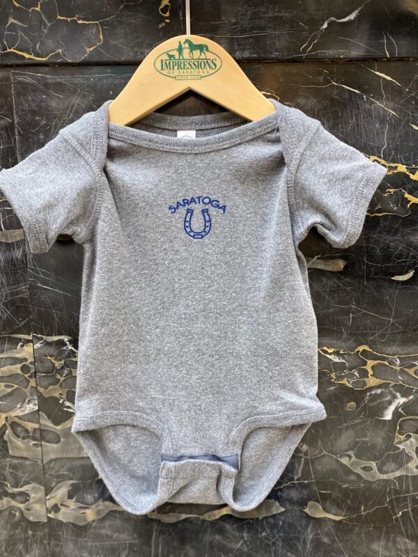 Grey onesie-blue Saratoga-horseshoe under-on chest