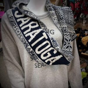 Super soft poly/cotton scarf, double sided design in navy/white with "Saratoga" on it. Displayed on mannequin.Navy/White
