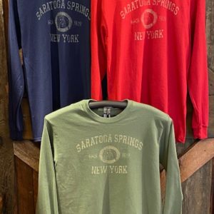 exclusive-long sleeve- tee shirt- front chest- Saratoga- crest with health, history, horses around horsehead-new york below- 3 colors-cardinal-military green-navy