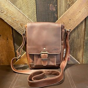 Brown leather messenger bag-front buckle- stamped with our Dark Horse logo
