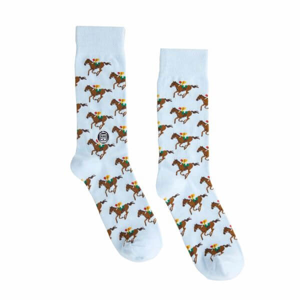 Light blue derby socks features brown racehorses with jockeys wearing yellow silks all over