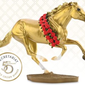 Model thoroughbred race horse Secretariat- horse is in gold with a band of roses across its back