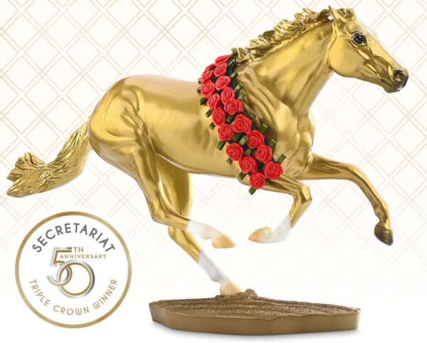 Model thoroughbred race horse Secretariat- horse is in gold with a band of roses across its back