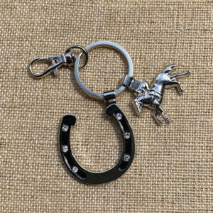 silver keychain with a horseshoe- 6 crystals in horseshoe- horse and jockey charm