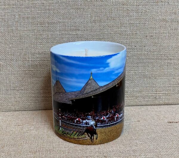 a candle featuring an actual photo of Saratoga race track and grandstand