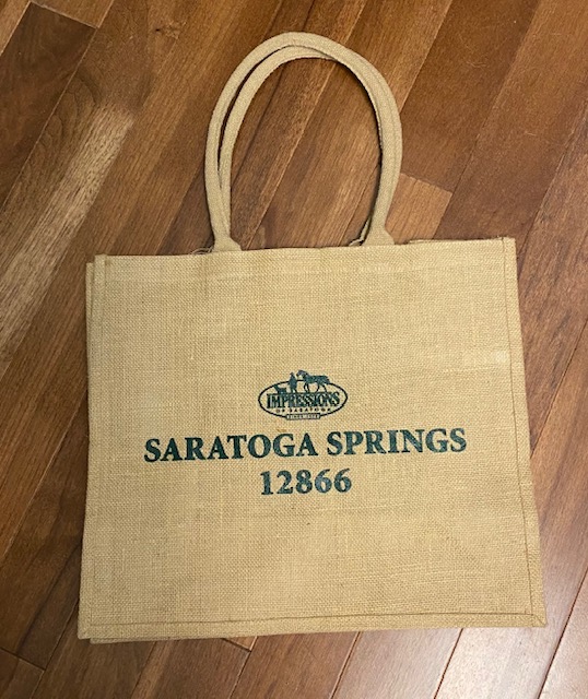 Jute tote bag Saratoga Springs and 12866 in green letters