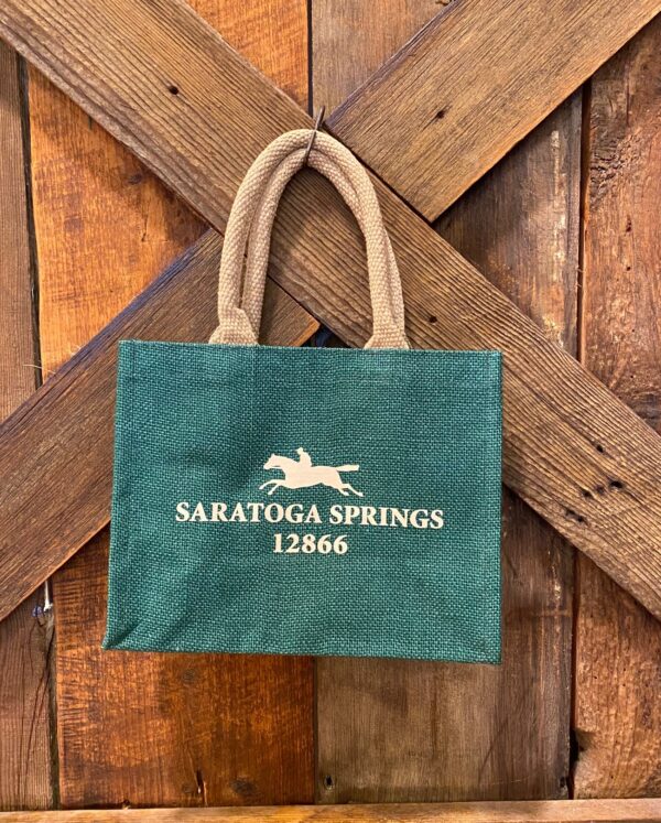 Green jut tote bag-tan handles- Saratoga springs with a horse and zip code on both sides- 12866