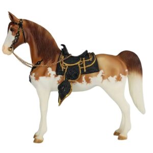 Model Horse-splashy red dun pinto coat, complete with his saddle, bridle, and breast collar accented in gold